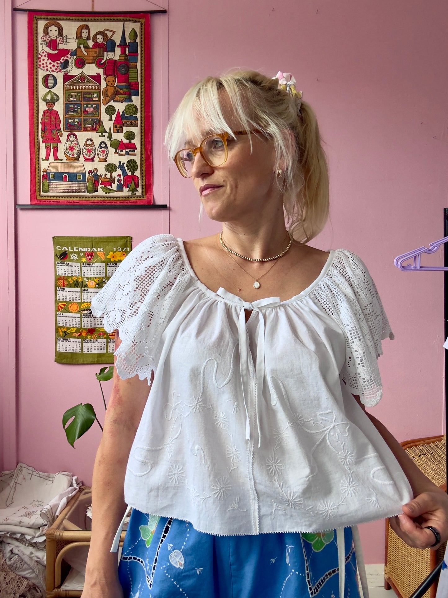 White blouse with lace sleeves