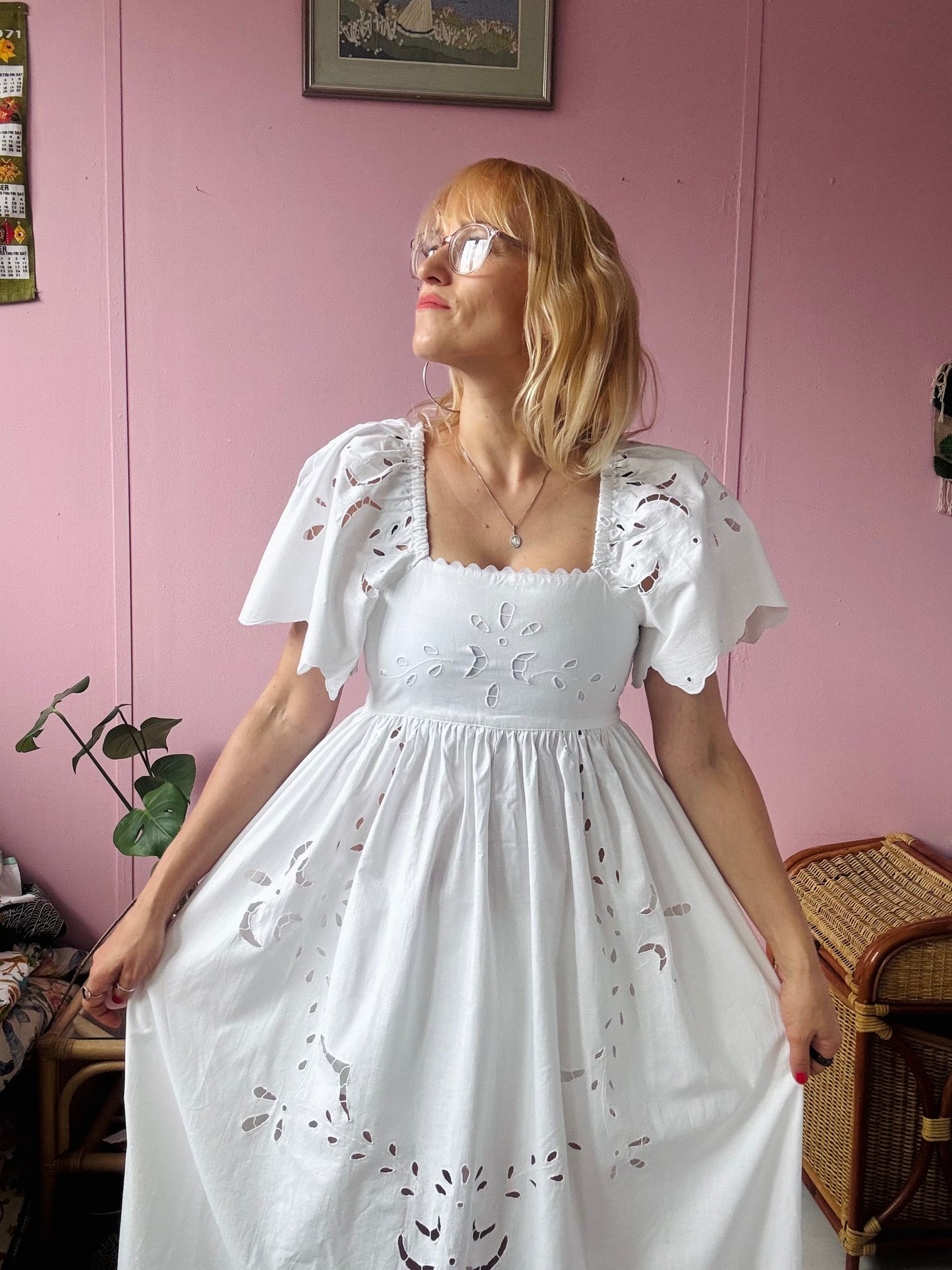 All white maxi dress with cut out embroidery