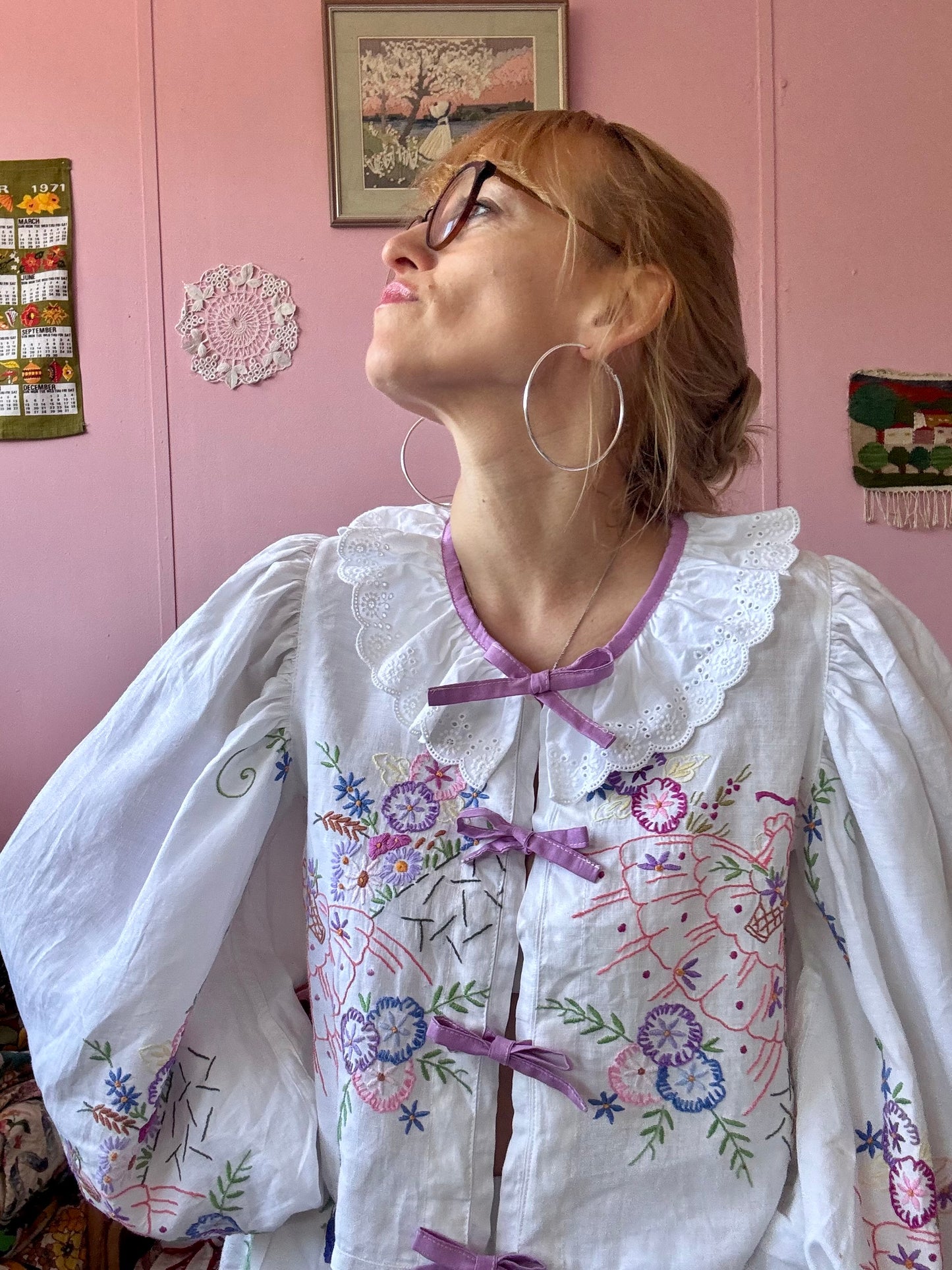 Blouse with lace neckline and lilac trimming