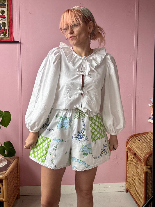 Green patchwork shorts